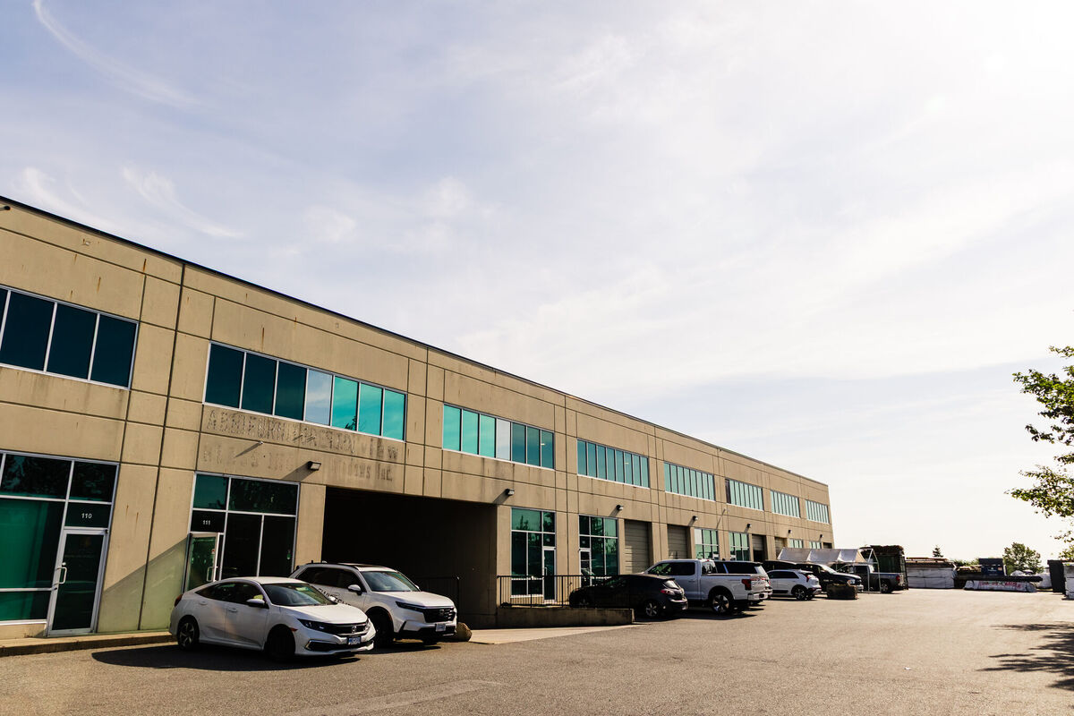 Exterior parking area serving the Holt Road industrial building